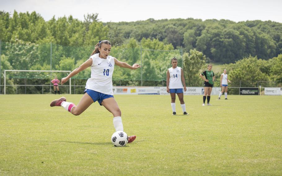 Emma Montoya, a junior with the Rota Admirals, goes to kick the ball in a match against the Naples Wildcats during the semifinals of the 2025 Division II girls soccer DODEA European championships at Reichenbach-Steegen, Germany on May 21, 2025.