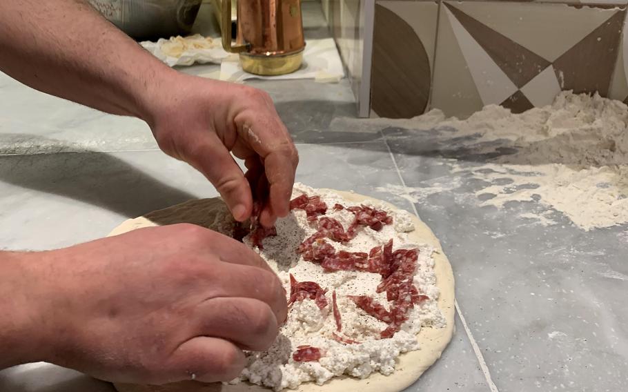 Stuffed pizzas and calzones also are on the menu, in additional to the more traditional pies, at Pizzeria Salvo in Naples, Italy. 