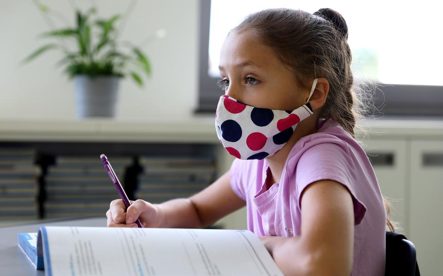 A student at Vogelweh Elementary School listens during a lesson in April 2020.