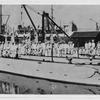A 1914 photo shows the U.S. submarine F-1, nearest the dock, which sank after a collision with submarine F-3, moored right beside it, in 1917. MUST CREDIT: Roy L. Noggle/U.S. Naval History and Heritage Command