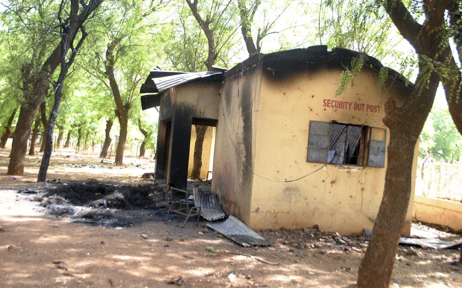 A burnt out security post is seen Friday, May 13, 2022. in Sokoto Nigeria, where a female student of Shehu Shagari College of Education was beaten and burned to death.