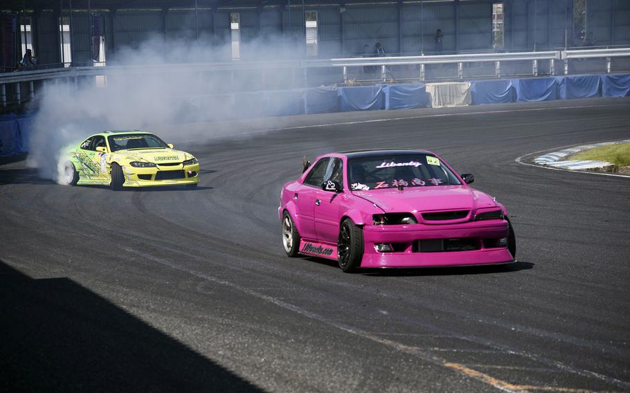 Drivers drift through a turn at Mobara Twin Circuit during a Butcher Style Racing 88 event in Chiba, Japan, Sept. 7, 2024.