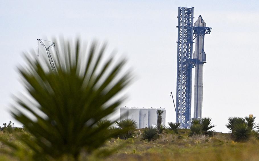 The SpaceX Starship spacecraft on a rocket booster at the company's launch facility in Boca Chica, Texas. 