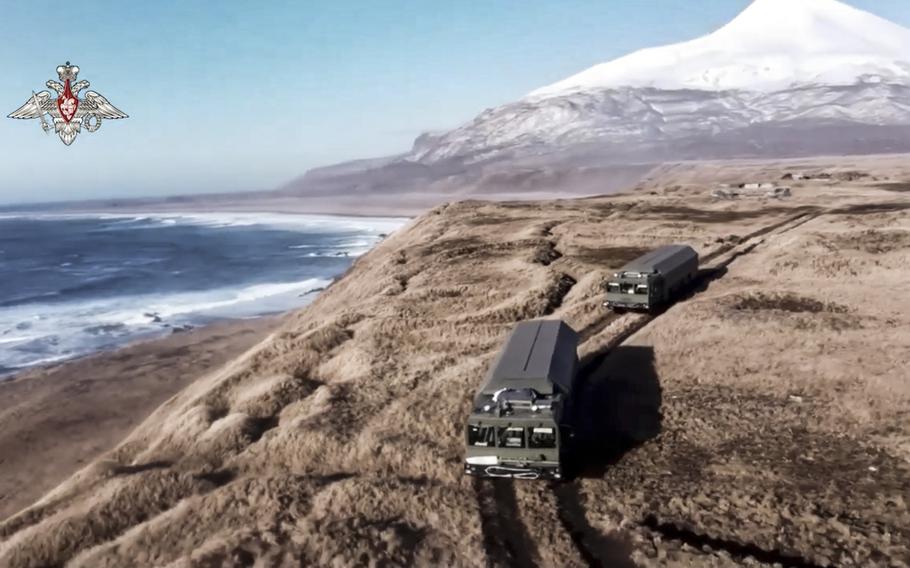 Bastion missile launchers move to their positions on the Matua Island, part of the Kurils Islands chain, in Russia, on Dec. 2, 2021. Russia’s military claimed it chased away a Virginia-class submarine in the Kuril Islands on Saturday, Feb. 11, 2022, a claim the U.S. Navy denied.