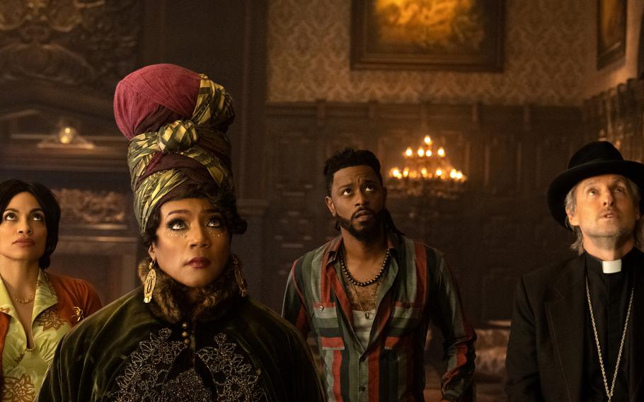 From left, Rosario Dawson, Tiffany Haddish, LaKeith Stanfield and Owen Wilson star in “Haunted Mansion,” now playing in select AAFES theaters.