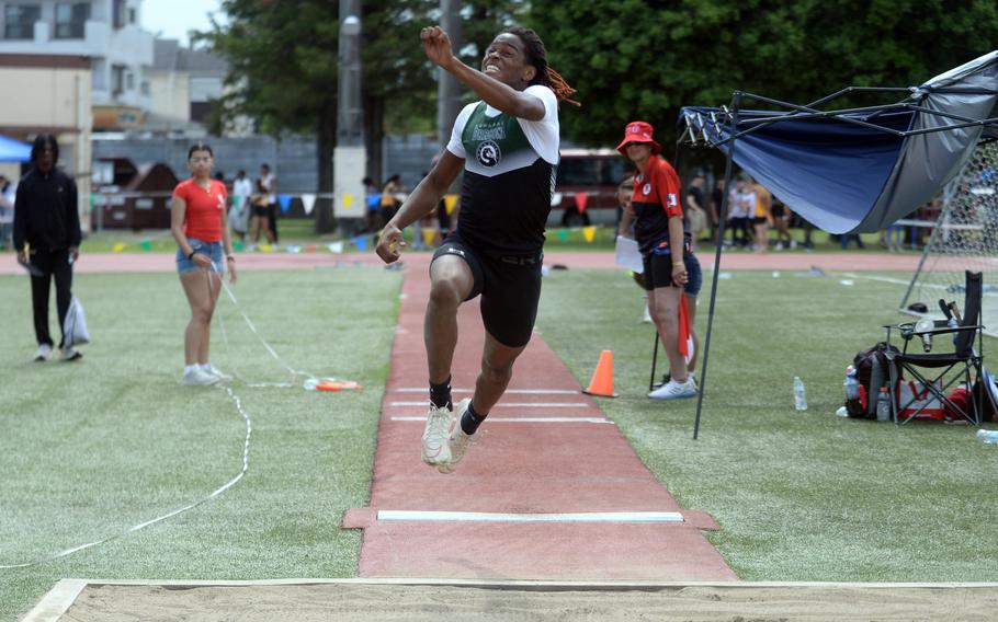 Kubasaki's Carlos Cadet leaps to a Far East meet record 13.40 in the triple jump.