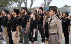 Lt. Col. Erin Fritzler, commander of the Los Angeles Recruiting Battalion, and recruits salute Lt. Gen. Jonathan Braga, the commanding general of the United States Army Special Operations Command, during the Torrance Armed Forces Day Parade in Torrance, California May 17, 2025. The Department of Defense sponsors the event each year to honor the service and sacrifices of the U.S. armed forces while fostering patriotism and community connections. (Photo by Staff Sgt. Brea DuBose)