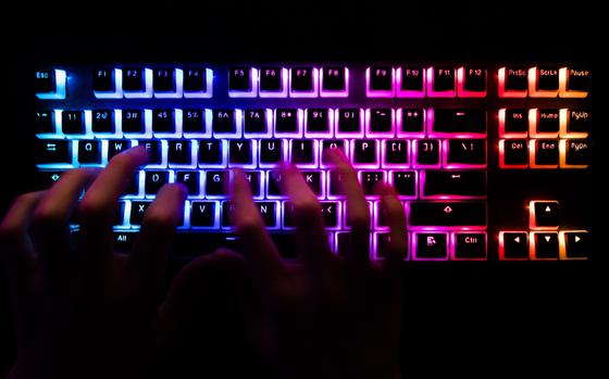 A back-lit computer keyboard. MUST CREDIT: Bloomberg photo by Chris Ratcliffe.