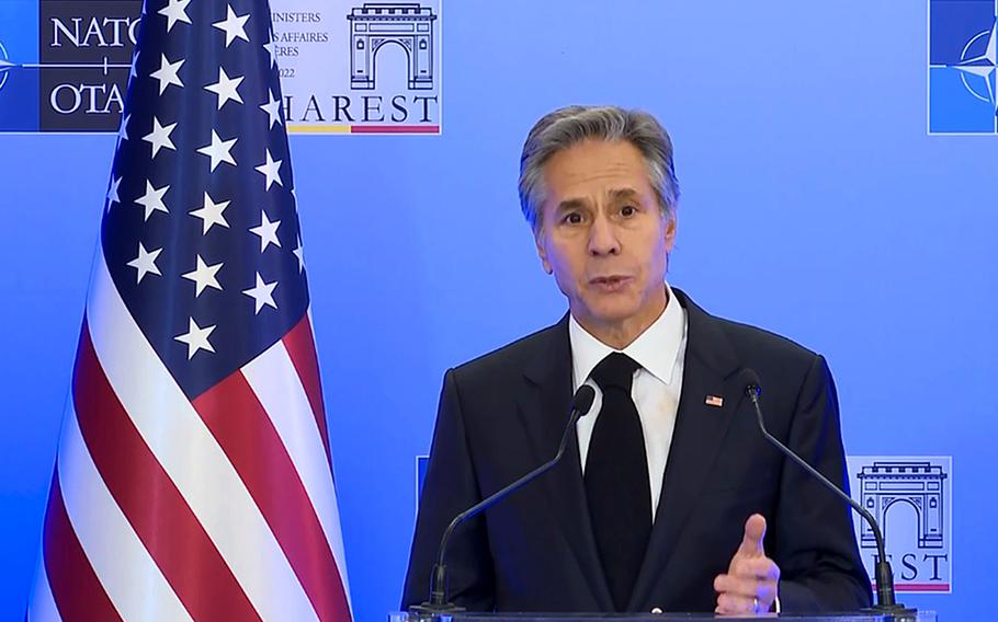 Secretary of State Antony Blinken talks to reporters following the NATO foreign ministers meeting in Bucharest, Romania, Nov. 30, 2022. Blinken announced that the U.S. will commit more than $53 million to help stabilize Ukraine’s energy grid.