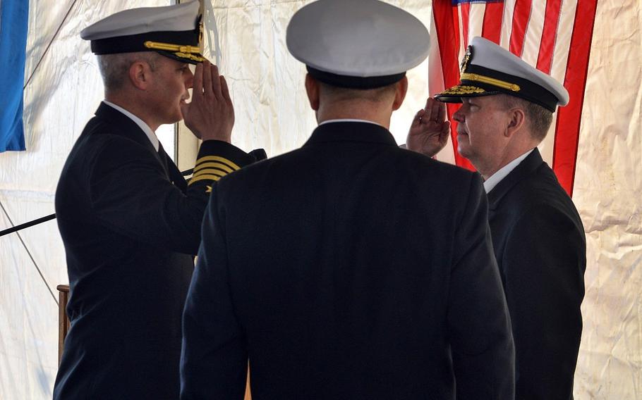 Capt. Matthew Kiser, left, the new commanding officer of the USS Mount Whitney, salutes U.S. 6th Fleet commander Vice Adm. Thomas Ishee at a change of command April 11, 2023, in Gaeta, Italy. Kiser relieved Capt. Daniel Prochazka.