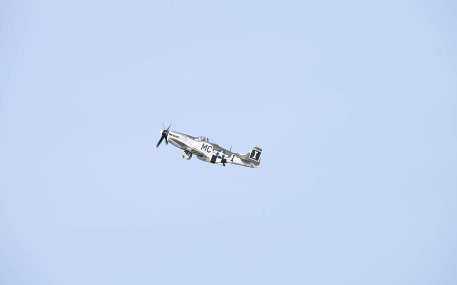 A P-51 Mustang from the Air Force Heritage Flight Foundation participates in a heritage flight during the Thunder Over the Rock Air Show at Little Rock Air Force Base, Oct. 21, 2023. 