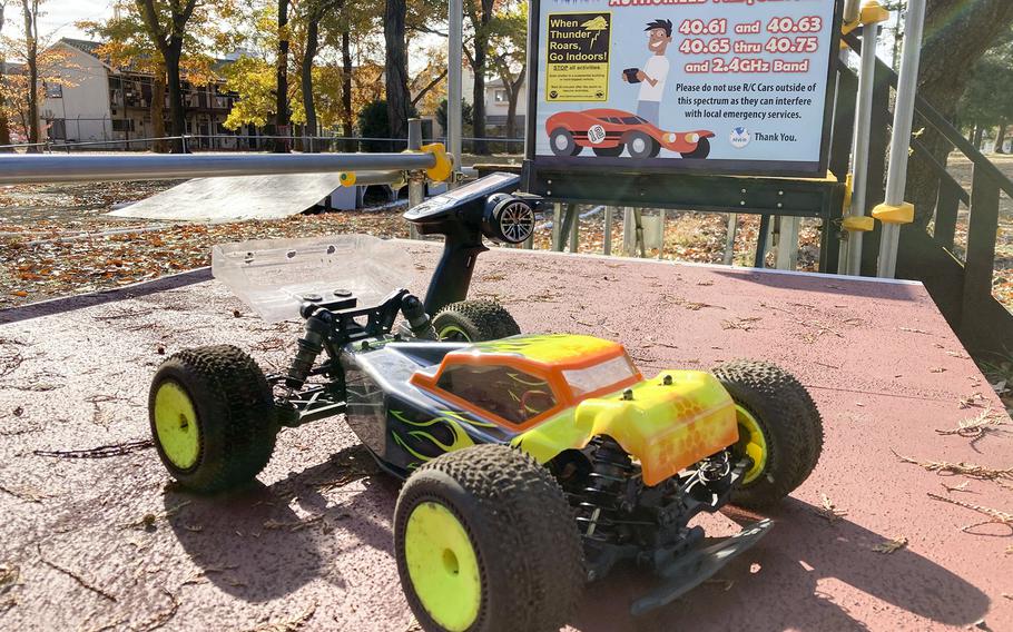 A radio-controlled buggy parks outside a new dirt racetrack at Sagamihara Housing Area near Camp Zama, Japan, Dec. 9, 2021. 
