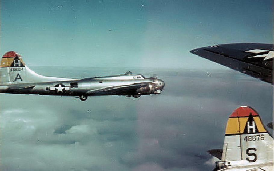An Army Air Force B-17 Flying Fortresses and pathfinder of the U.S. 8th Air Force, 306th Bomb Group in flight during a mission in World War II. 