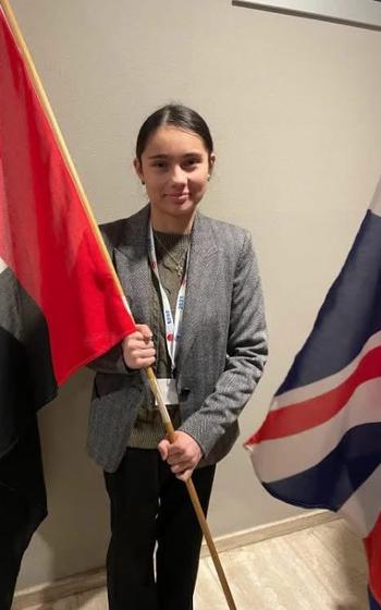 Celia Overson, a junior at Wiesbaden High School, poses for a photo in her role as Ambassador of the delegation of the United Arab Emirates during her trip to the World Forum in The Hague in the Netherlands, Jan. 31, 2025. 