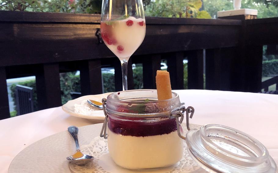 Our desert to end a delicious meal at Forsthaus Rheinblick in Wiesbaden, Germany, was “tipsy” lemon sorbet
topped up with fresh berries and a dash of Rheingau Riesling sparkling wine, rear, and homemade panna cotta topped with wild berries.