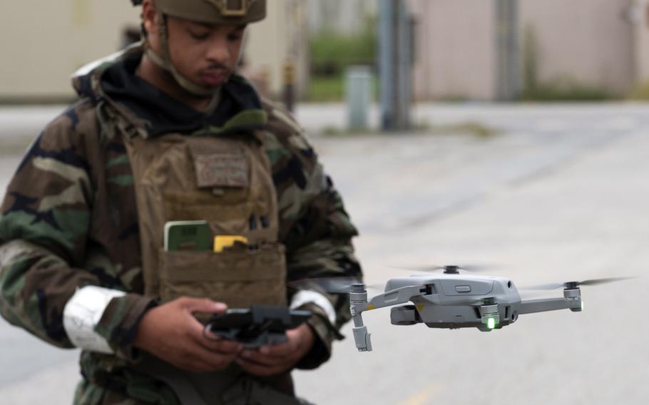 Senior Airman Austin Geter of the 51st Security Forces Squadron operates a drone during training at Osan Air Base, South Korea, Sept. 13, 2022.