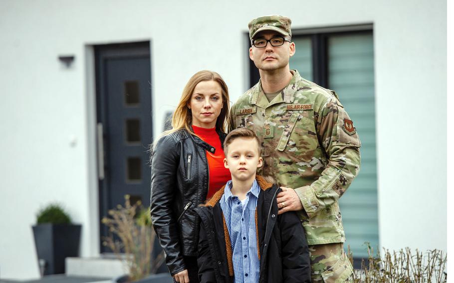 Then-Master Sgt. Matthew Larsen, wife Kathrin and son Jayden stand in front of their house in Reichweiler, Germany, on March 11, 2020. A German tax office recently decided to stop pursuing its case against the recently retired airman.