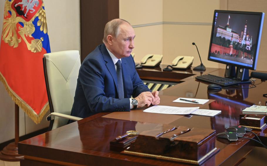 Russian President Vladimir Putin takes part in the launch of a new ferry via a conference call at the Novo-Ogaryovo residence outside Moscow Moscow, Russia, Friday, March 4, 2022. 
