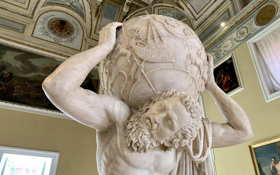 A statue of Atlas holding a globe