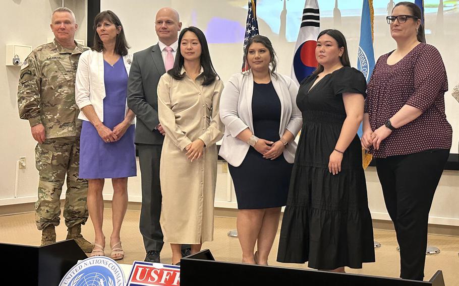 U.S. Forces Korea commander Gen. Paul LaCamera and his wife, Theresa LaCamera, pose with award winners from Department of Defense Education Activity’s Pacific West district at Camp Humphreys, South Korea, Friday, May 19, 2023. From left to right, the LaCameras, district superintendent Jacob Sherwood; Seong Yeon Park, of the student transportation office; Juliana Wish, administrative support assistant for Humphreys West Elementary School; Sara Mayer, math teacher at Osan Middle High School; and Mandy Schwerdt-Johnson, principal at Humphreys High School. 