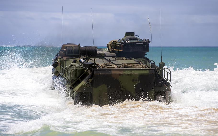 Marines from Company B, 3rd Assault Amphibian Battalion train in an assault amphibious vehicle at Camp Schwab, Okinawa, June 2, 2021.