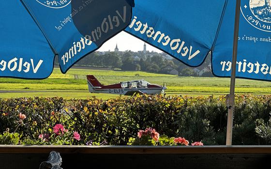 Planes taking off and landing at the Weiden airport are visible to patrons at Pegasus Pizzeria. The setting next to the airport provides a distinctive atmosphere for a meal at the eatery in the German state of Bavaria. 