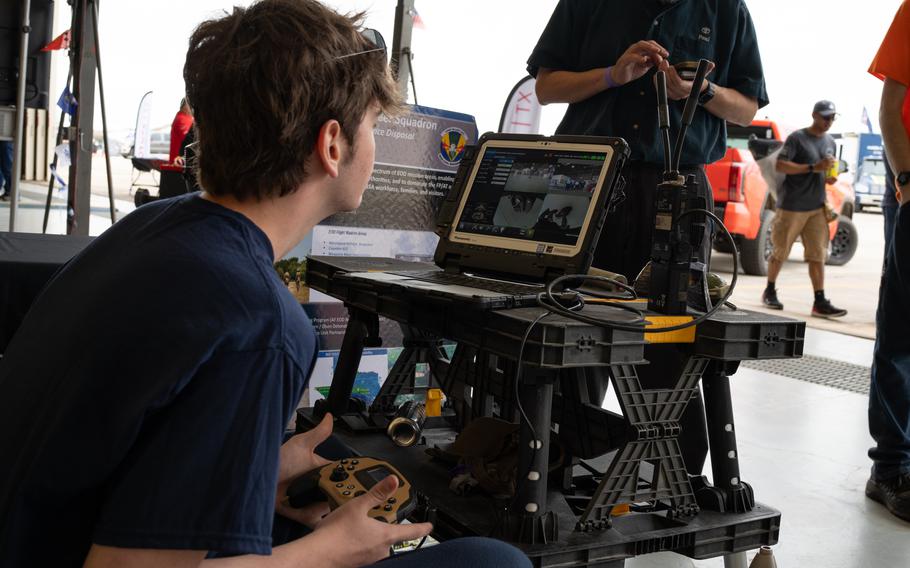 Alex Anderson uses an Explosive Ordnance Disposal robot during a demonstration with 902nd Civil Engineering Squadron as part of a STEM Expo at The Great Texas Airshow, Joint Base San Antonio-Randolph, Texas, Saturday, April 6, 2024. Air shows provide visitors the opportunity to get up close to state-of-the-art equipment and to learn more about Air Force missions and innovation. 