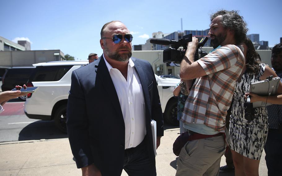 Alex Jones arrives at the Travis County Courthouse in Austin, Tuesday Aug. 2, 2022.