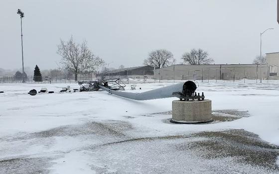 A light pole lays on the ground near Wright-Patterson Air Force Base’s flightline after it was blown over by high winds during a winter storm Dec. 23, 2022. The storm caused nearly $4 million in damage across both areas of the installation. (Contributed photo)
