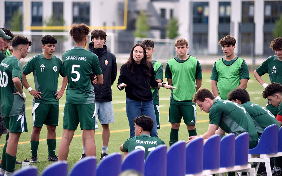 SHAPE coach Erika Aquino rallies the Spartans at halftime of the Division I final against Ramstein at the DODEA European championships on May 23, 2024, at Ramstein High School on Ramstein Air Base, Germany.