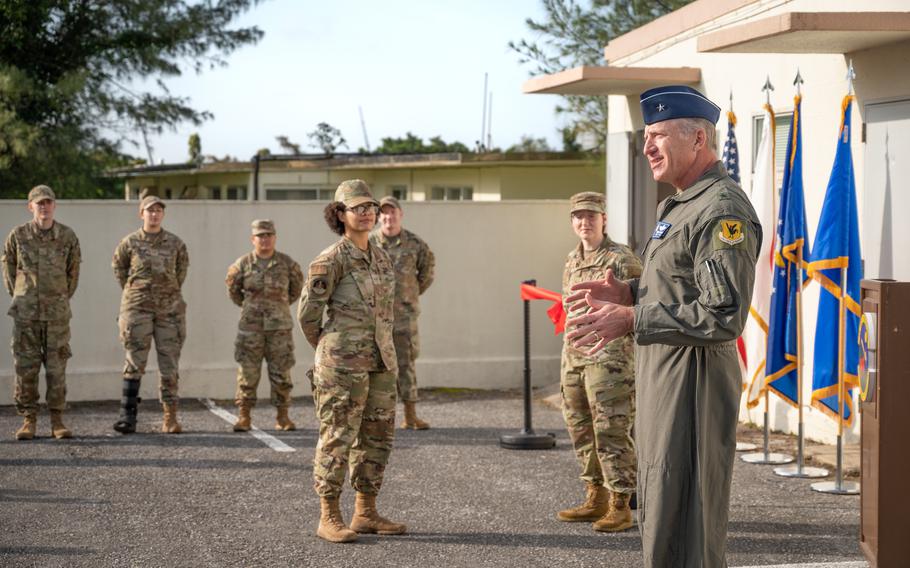 Air Force Brig. Gen. David Eaglin, 18th Wing commander, addresses a crowd Feb. 8, 2023, during a ribbon cutting ceremony at Kadena Air Base, Japan. The Kadena food pantry is the first military-affiliated food pantry located on Okinawa. 