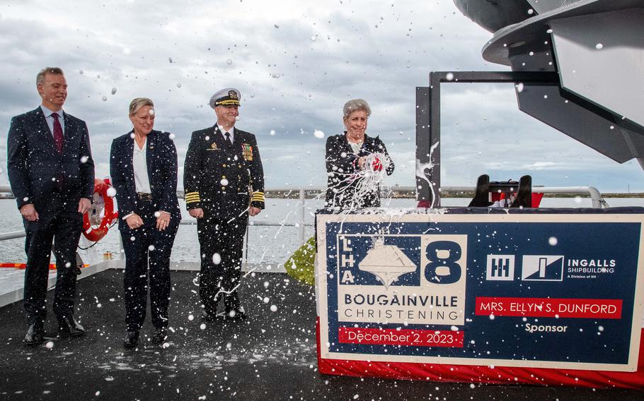 Ship’s sponsor Ellyn S. Dunford christened the Bougainville (LHA 8) at HII’s Ingalls Shipbuilding. Pictured from left is Under Secretary of the Navy Erik Raven, Ingalls Shipbuilding President Kari Wilkinson, Prospective Commanding Officer, Bougainville (LHA 8) Capt. Harry Marsh, and ship’s sponsor Ellyn S. Dunford.