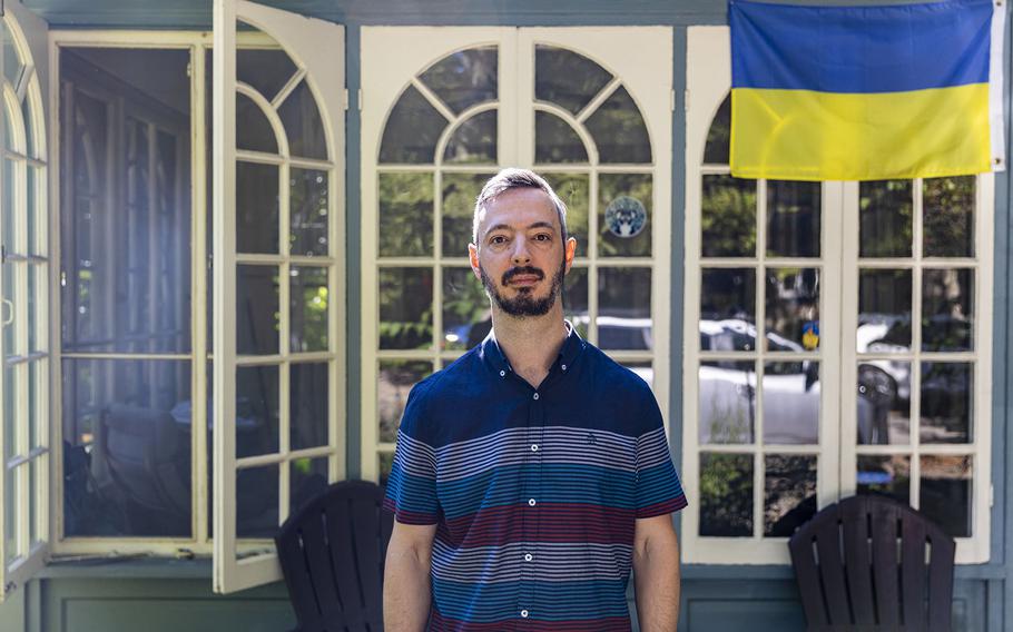 Roman Strakovsky of Mount Airy, a cofounder of Philly Stands with Ukraine, stands outside his home. 