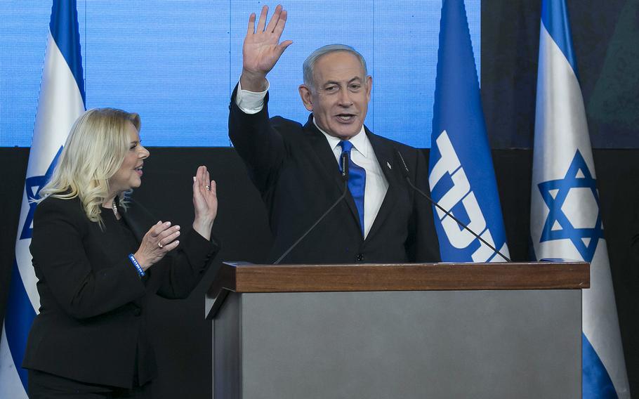 Former Israeli Prime Minister Benjamin Netanyahu and his wife Sara Netanyahu greet supporters at an election-night event on Nov. 1, 2022, in Jerusalem. 