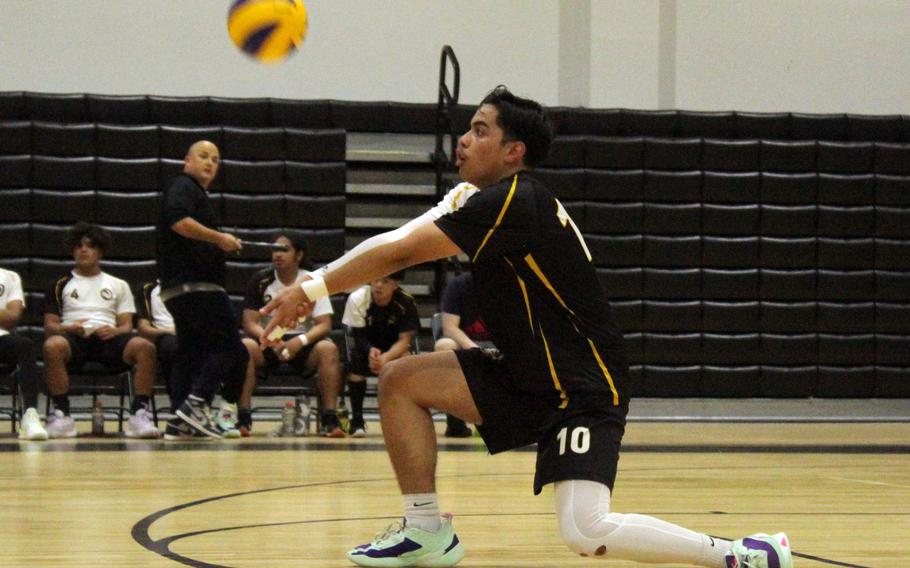 Humphreys' Jaeten Abraham bumps the ball against Seoul Foreign during Wednesday's Korea boys volleyball match. The Crusaders won in three sets.