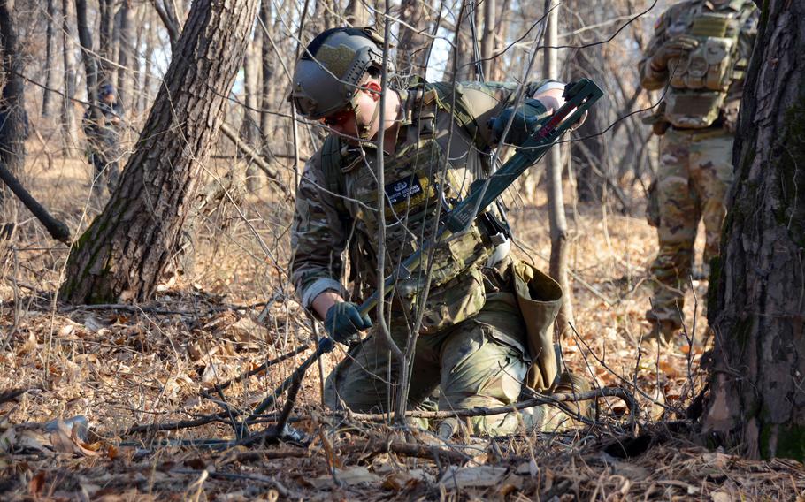 Army Staff Sgt. Austin Beekman takes part in the Korea EOD Team of the Year competition at Camp Humphreys, South Korea, Jan. 11, 2023. He's a member of the 718th Ordnance Company (EOD), 23rd Chemical, Biological, Radiological and Nuclear Battalion.