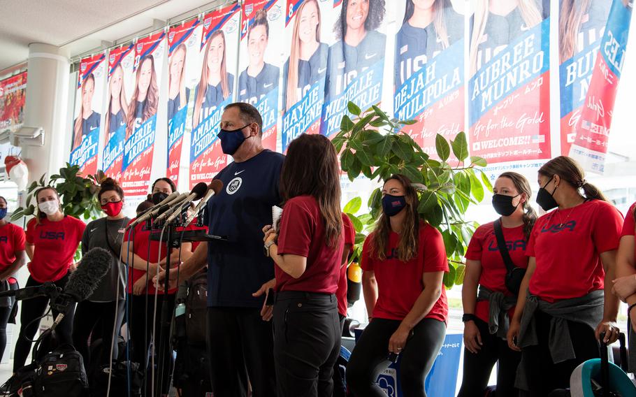 U.S. women’s Olympic softball team head coach Ken Eriksen speaks to reporters after landing at Marine Corps Air Station Iwakuni, Japan, Monday, July 5, 2021. 