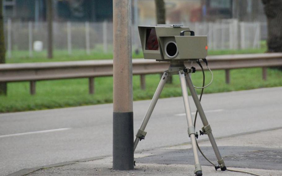 An automatic speed camera enforces the speed limit on a German roadside.