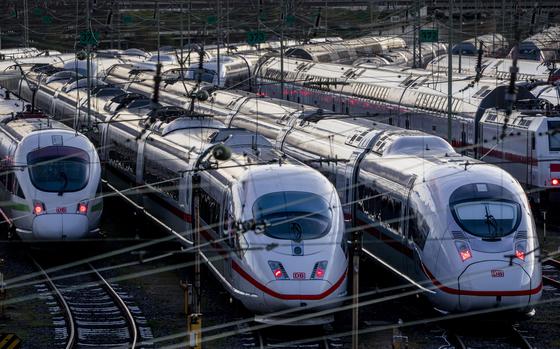 FILE - ICE trains are parked near the central train station in Frankfurt, Germany, Monday, March 27, 2023. A union representing many of Germany's train drivers says it and the country's main railway operator have reached a deal in a long dispute over working hours and pay that was marked by a string of strikes. Neither the GDL union nor state-owned railway operator Deutsche Bahn gave details of their agreement on Monday. Both scheduled separate statements on Tuesday. (AP Photo/Michael Probst, File)