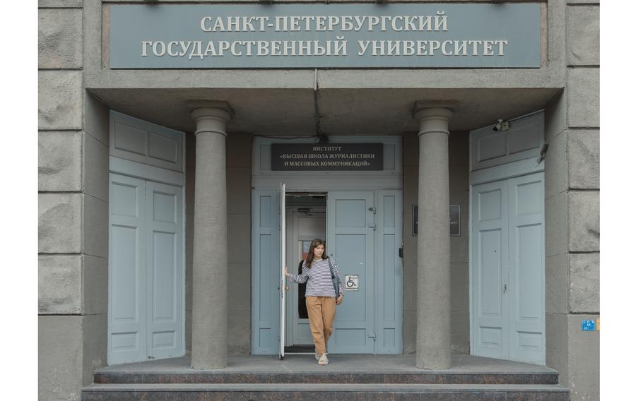 Yelizaveta Antonova leaves the journalism college at St. Petersburg State University. She believes a protest of an attack on a reporter cost her a spot in graduate school. 