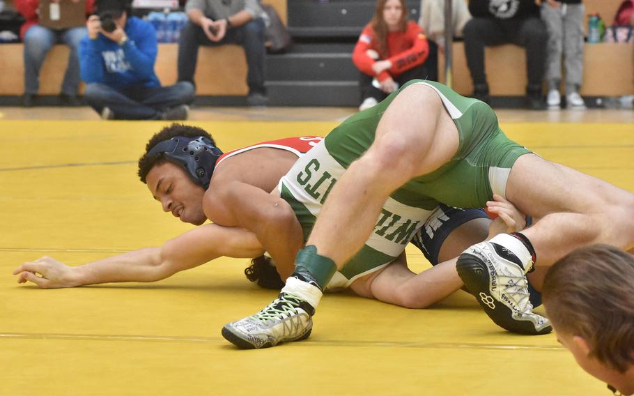 Aviano’s Aaron Smith thought he had a pin of Naples’ Kyson Fromm in a 157-pound semifinal match at the DODEA European Wrestling Championships on Saturday, Feb. 10, 2024. But Fromm was later awarded the win after getting hurt on an illegal throw.