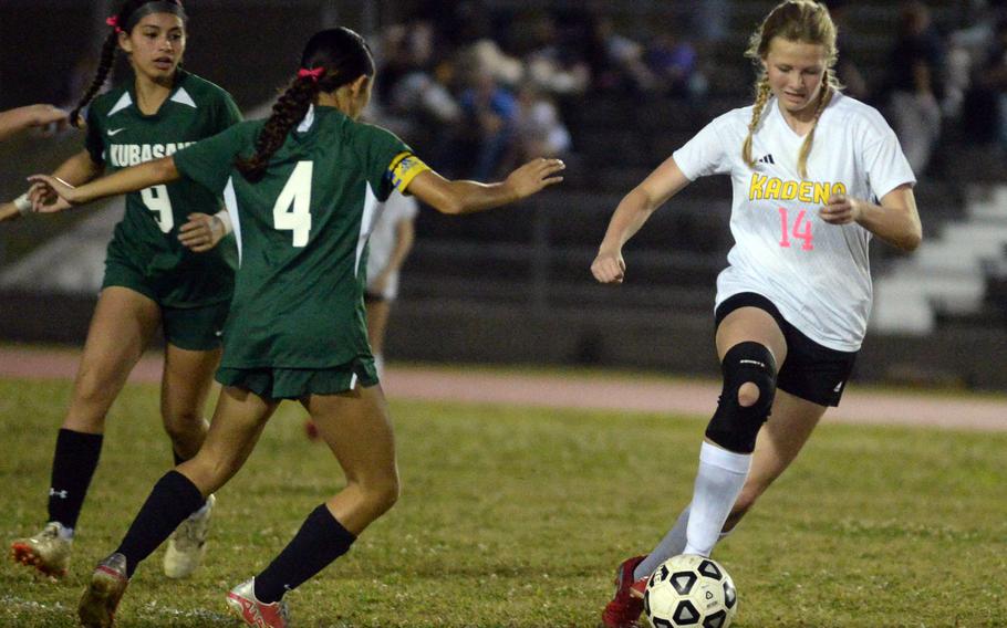 Brooke Brewer dribbles upfield.