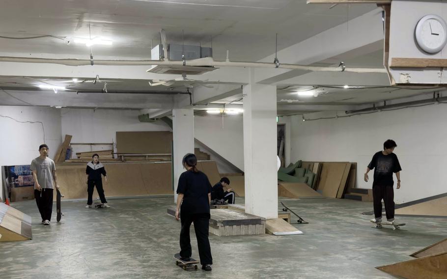 The ramps are worn, with graffiti in all the right places at Stallboards, a skate shop and indoor skatepark in Suwon, South Korea.