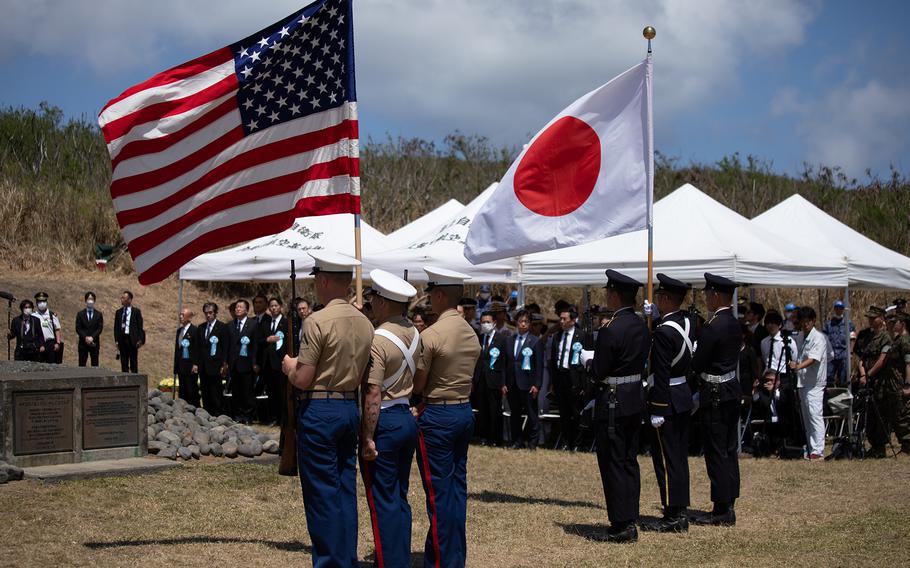 A color guard of U.S. Marines and Japan Self-Defense Force members stand at the Reunion of Honor ceremony at Iwo Jima, also referred to as Iwo To, Japan, on March 25, 2023.