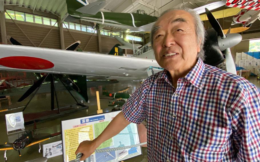 Nobuo Harada, 85, stands in his Kawaguchiko Zero Fighter Museum near Mount Fuji, Japan, Sunday, July 31, 2022. 