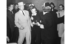 A Pulitzer-Prize-winning photo originally published on Nov. 25, 1963, in the Dallas Times Herald shows Jack Ruby shooting Lee Harvey Oswald. 

