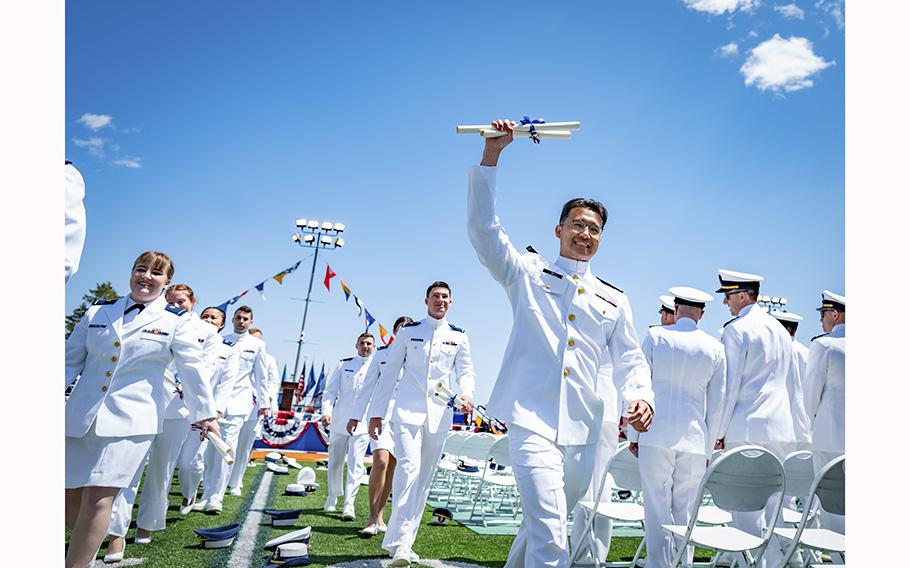 Graduating cadets march off with their diplomas after their commencement ceremony at the Coast Guard Academy, where Secretary of Homeland Security Alejandro Mayorkas delivered the keynote address on Wednesday, May 17, 2023. 
