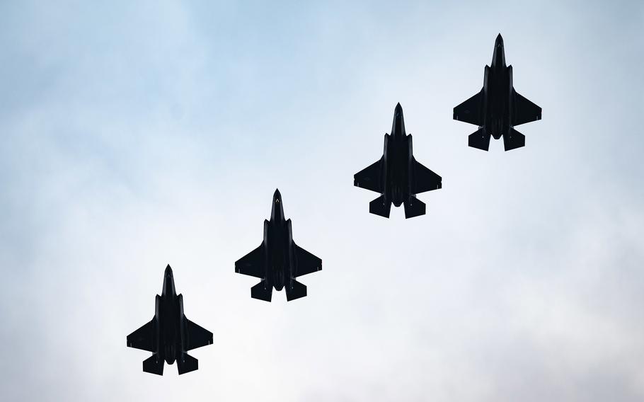 U.S. Air Force F-35A Lightning IIs assigned to the 495th Fighter Squadron do a flyover at RAF Lakenheath, England, on Dec. 15, 2021. Lakenheath became the first U.S. air base in Europe to receive an F-35A.