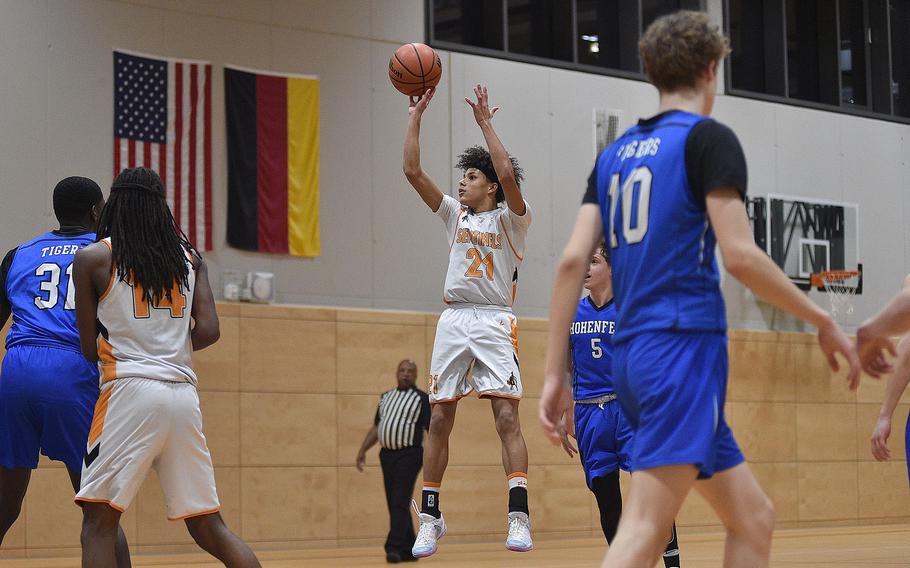 Spangdahlem's Cameron Lewis shoots during a basketball game against Hohenfels on Jan. 26, 2024, at Spangdahlem High School in Spangdahlem, Germany.