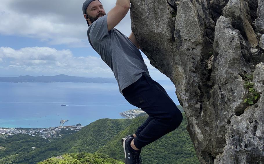 Just past the summit of Okinawa’s Mount Katsuu is a giant projecting rock you can hang from. If photographed at the right angle, it gives the illusion that you are hanging from a dangerous height. 